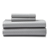 These cotton sateen sheets feature a lattice print in grey and aqua on a stone colored canvas. These cotton sateen sheets feature a lattice print in grey and aqua on a stone colored canvas.