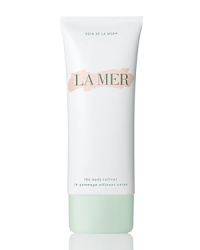 Infused with 1.75 carats of pure diamond powder, La Mer The Body Refiner polishes the skin and lifts away dull skin cells, gently retexturizing the skin. This spa-like treatment is embedded within La Mer's legendary emollients to cushion the skin while protecting its delicate moisture barrier. Fermented acidic sea muds detoxify and purify the skin for a bright, healthy appearance. A low pH level makes them particularly gentle, ideal for sensitive skin. Tourmaline and sea quartz stimulate circulation and awaken the skin. Hyraluronic Acid and a micro-algae complex attract and capture moisture to soften and refresh the skin. Infused with 1.75 carats of pure diamond powder, La Mer The Body Refiner polishes the skin and lifts away dull skin cells, gently retexturizing the skin. This spa-like treatment is embedded within La Mer's legendary emollients to cushion the skin while protecting its delicate moisture barrier. Fermented acidic sea muds detoxify and purify the skin for a bright, healthy appearance. A low pH level makes them particularly gentle, ideal for sensitive skin. Tourmaline and sea quartz stimulate circulation and awaken the skin. Hyraluronic Acid and a micro-algae complex attract and capture moisture to soften and refresh the skin.