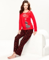 Let it snow. These pajamas by HUE feature a cute dog and snowflakes on the top and polka dot fleece pants. Let it snow. These pajamas by HUE feature a cute dog and snowflakes on the top and polka dot fleece pants.