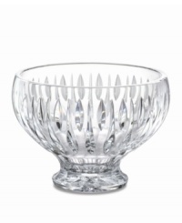 A series of vertical wedge cuts around the side of this lead crystal bowl create an effect of subtle radiance. Measuring 8 in diameter with a dramatic raised base. A series of vertical wedge cuts around the side of this lead crystal bowl create an effect of subtle radiance. Measuring 8 in diameter with a dramatic raised base.