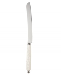 An embossed vine motif and shiny white glaze makes this Lenox cake knife worthy of cutting and plating even the finest confections. Coordinates with Opal Innocence Carved dinnerware. An embossed vine motif and shiny white glaze makes this Lenox cake knife worthy of cutting and plating even the finest confections. Coordinates with Opal Innocence Carved dinnerware.