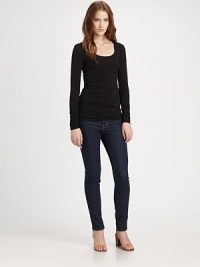 Lengthy, cotton-rich scoopneck with a touch of stretch makes for the perfect layering piece. Scoopneck Long sleeves Longer length hits below the hips 90% supima cotton/10% spandex Machine wash Made in USA Lengthy, cotton-rich scoopneck with a touch of stretch makes for the perfect layering piece. Scoopneck Long sleeves Longer length hits below the hips 90% supima cotton/10% spandex Machine wash Made in USA
