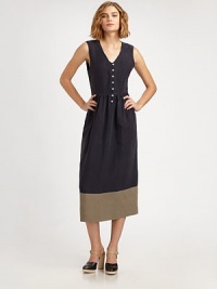 Lengthy, two-tone v-neck with a shirred waist, button front and slash pockets. V-neckSleevelessButton frontGathered waistbandSlash pocketsAbout 36 from natural waist55% linen/45% silkDry cleanMade in USA of imported fabricModel shown is 5'10½ (179cm) wearing US size 4. Lengthy, two-tone v-neck with a shirred waist, button front and slash pockets. V-neckSleevelessButton frontGathered waistbandSlash pocketsAbout 36 from natural waist55% linen/45% silkDry cleanMade in USA of imported fabricModel shown is 5'10½ (179cm) wearing US size 4.