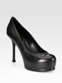 Platform silhouette of luxe leather, upgraded with a towering heel and classic round toe. Self-covered heel, 4¼ (110mm)Covered platform, 1¼ (30mm)Compares to a 3 heel (75mm)Leather upperLeather lining and solePadded insoleMade in ItalyOUR FIT MODEL RECOMMENDS ordering one half size up as this style runs small. Platform silhouette of luxe leather, upgraded with a towering heel and classic round toe. Self-covered heel, 4¼ (110mm)Covered platform, 1¼ (30mm)Compares to a 3 heel (75mm)Leather upperLeather lining and solePadded insoleMade in ItalyOUR FIT MODEL RECOMMENDS ordering one half size up as this style runs small.