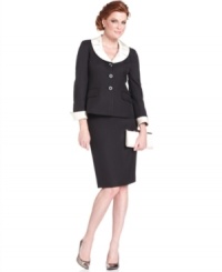A truly elegant look starts with contrast, texture and sleek silhouettes. Le Suit's ensemble features unique details that elevate a classic combination. A truly elegant look starts with contrast, texture and sleek silhouettes. Le Suit's ensemble features unique details that elevate a classic combination.