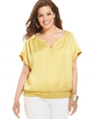 Lend a polished finish to your casual looks with Alfani's short sleeve plus size top, punctuated by a smocked hem. Lend a polished finish to your casual looks with Alfani's short sleeve plus size top, punctuated by a smocked hem.