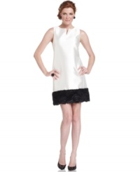 Tahari by ASL's latest dress goes completely classic with a shift silhouette and contrasting, rosette-trimmed hemline. Tahari by ASL's latest dress goes completely classic with a shift silhouette and contrasting, rosette-trimmed hemline.