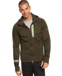 Conveniently listen to your MP3 player as you dash in Nike's Element Shield Max running jacket featuring an adjustable interior hood for extra warmth plus reflective strips for night visibility. Conveniently listen to your MP3 player as you dash in Nike's Element Shield Max running jacket featuring an adjustable interior hood for extra warmth plus reflective strips for night visibility.