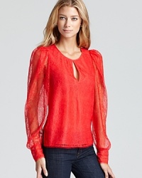 Sheer lace and an alluring front keyhole romance this on-trend BCBGMAXAZRIA blouse with the feminine details you look for and love. Sheer lace and an alluring front keyhole romance this on-trend BCBGMAXAZRIA blouse with the feminine details you look for and love.