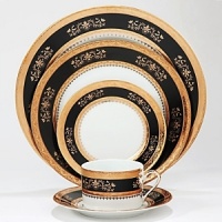 The Orsay Black/Gold dinner plates by Philippe Deshoulieres features a delicate gold pattern set against a black background that subtly references Limoges. Inspired by the famous 19th century Parisian train station on the banks of the Seine, this collection is sure to add old world romance to your table setting.