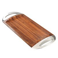 A vision in acacia wood bookended by burnished metal alloy, this Grande Wood Tray is pure distinction. Ideal for serving cocktails, hors d'oeuvres, or tea, this tray does double duty as an attractive base for a display of decorative items. A vision in acacia wood bookended by burnished metal alloy, this Grande Wood Tray is pure distinction. Ideal for serving cocktails, hors d'oeuvres, or tea, this tray does double duty as an attractive base for a display of decorative items.