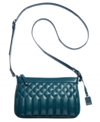Jet around town with this fashionista-friendly design from Nine West that's practical and on-trend. Convenient crossbody strap keeps hands free to access pockets and compartments when you're on-the-move. Jet around town with this fashionista-friendly design from Nine West that's practical and on-trend. Convenient crossbody strap keeps hands free to access pockets and compartments when you're on-the-move.
