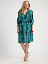 Perfectly printed, this satin design features an irresistible, tie-neck detail and a comfortable, elasticized waist. Pair this dress with nude-colored pumps.Self-tie detail at v-necklineThree-quarter sleevesButton detail on sleevesAllover printElasticized waistAbout 26 from natural waist60% silk/40% polyesterDry cleanMade in USA of imported fabric Perfectly printed, this satin design features an irresistible, tie-neck detail and a comfortable, elasticized waist. Pair this dress with nude-colored pumps.Self-tie detail at v-necklineThree-quarter sleevesButton detail on sleevesAllover printElasticized waistAbout 26 from natural waist60% silk/40% polyesterDry cleanMade in USA of imported fabric