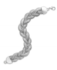 Braided beauty. This sophisticated Alfani bracelet features a twisted silhouette set in imitation rhodium tone mixed metal. Approximate length: 8 inches. Braided beauty. This sophisticated Alfani bracelet features a twisted silhouette set in imitation rhodium tone mixed metal. Approximate length: 8 inches.