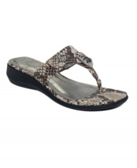 Casual with a chic twist. Rock a laid-back look with Marc Fisher's Arock thong sandals. Crafted in unique finishes, there's a pair for every look you can imagine. Casual with a chic twist. Rock a laid-back look with Marc Fisher's Arock thong sandals. Crafted in unique finishes, there's a pair for every look you can imagine.