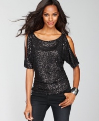 Sparkling sequins provide a festive look to INC's top, which also features alluring shoulder cutouts! Sparkling sequins provide a festive look to INC's top, which also features alluring shoulder cutouts!