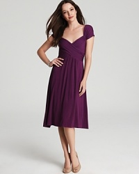 Ladylike and lovely, this Nola Z dress pairs a fitted bodice with a full skirt for a fetching hourglass silhouette. Finish the style with polished pumps for a decidedly feminine statement. Ladylike and lovely, this Nola Z dress pairs a fitted bodice with a full skirt for a fetching hourglass silhouette. Finish the style with polished pumps for a decidedly feminine statement.