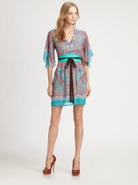 Epitome of femininity-- this paisley-print silk dress has romantic flutter sleeves and a contrasting self tie. V-neckThree-quarter flutter sleevesSelf tie at waistInvisible back zipperAbout 20 from natural waistSilkDry cleanMade in USA of imported fabricModel shown is 5'10 (177cm) wearing US size 2. Epitome of femininity-- this paisley-print silk dress has romantic flutter sleeves and a contrasting self tie. V-neckThree-quarter flutter sleevesSelf tie at waistInvisible back zipperAbout 20 from natural waistSilkDry cleanMade in USA of imported fabricModel shown is 5'10 (177cm) wearing US size 2.
