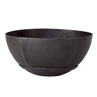 Handcrafted in India, this matte black metal bowl combines a primitive rustic look with all the benefits of modern design. Functioning elegantly as a decorative piece, it can also be used to feature certain foods. Handcrafted in India, this matte black metal bowl combines a primitive rustic look with all the benefits of modern design. Functioning elegantly as a decorative piece, it can also be used to feature certain foods.