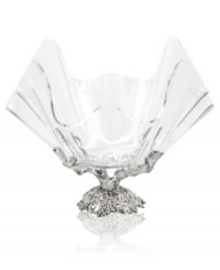 An eye-catching bowl adds sophistication to any gathering. Rendered in sand-cast, hand-finished aluminum, the base features a pattern of sculpted grapes. Complete with acrylic bowl. An eye-catching bowl adds sophistication to any gathering. Rendered in sand-cast, hand-finished aluminum, the base features a pattern of sculpted grapes. Complete with acrylic bowl.