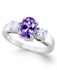 A true beauty. This stunning ring features an oval-cut tanzanite center stone (1-3/8 ct. t.w.) accented by round-cut diamonds on the sides (3/8 ct. t.w.). Set in 14k white gold. A true beauty. This stunning ring features an oval-cut tanzanite center stone (1-3/8 ct. t.w.) accented by round-cut diamonds on the sides (3/8 ct. t.w.). Set in 14k white gold.