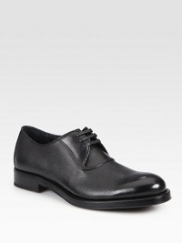 Printed calfskin lace-up with piping detail and double leather sole.Leather upperLeather liningPadded insoleLeather soleMade in Italy Printed calfskin lace-up with piping detail and double leather sole.Leather upperLeather liningPadded insoleLeather soleMade in Italy