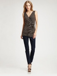 Finely-striped jersey styled with a flattering surplice bodice that hugs your curves.V necklineSleevelessSurplice bodiceAbout 27 from shoulder to hem96% rayon/4% spandexDry cleanMade in USAModel shown is 5'9 (175cm) wearing US size Small. Finely-striped jersey styled with a flattering surplice bodice that hugs your curves.V necklineSleevelessSurplice bodiceAbout 27 from shoulder to hem96% rayon/4% spandexDry cleanMade in USAModel shown is 5'9 (175cm) wearing US size Small.