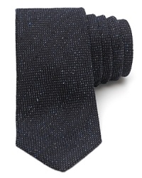 A carefully woven blend of fine silk and soft wool expresses your discerning taste for quality and refinement with this handsome skinny tie from Theory. A carefully woven blend of fine silk and soft wool expresses your discerning taste for quality and refinement with this handsome skinny tie from Theory.