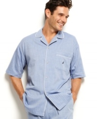 Whether you're heading to bed or just lounging around the house, this button-down camp shirt offers a great combination of comfort and classic style. Whether you're heading to bed or just lounging around the house, this button-down camp shirt offers a great combination of comfort and classic style.