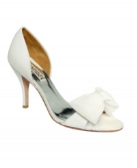 Cuteness comes in twos. Badgley Mischka's Zandra Two Piece pumps are super pretty and feature a great bow detail at the toe. Cuteness comes in twos. Badgley Mischka's Zandra Two Piece pumps are super pretty and feature a great bow detail at the toe.