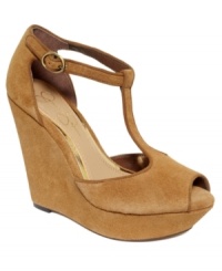 Completely cute. Jessica Simpson's Shama platform wedge sandals feature a smooth suede upper and a darling t-strap that's sure to make you smile. Completely cute. Jessica Simpson's Shama platform wedge sandals feature a smooth suede upper and a darling t-strap that's sure to make you smile.