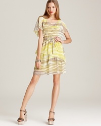 At once feminine and modern, this Max & Cleo dress touts a painterly print and ruffled skirt--cinched at the waist with a belt. At once feminine and modern, this Max & Cleo dress touts a painterly print and ruffled skirt--cinched at the waist with a belt.
