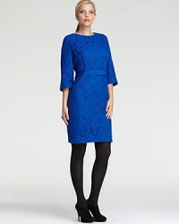 Brimming with modern romance, delicate lace lends polished femininity to a Taylor Dresses Plus sheath dress.