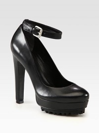 Ultra-high heel and platform carry this smooth leather pump with a rubber sole and an adjustable ankle strap. Self-covered heel, 5 (125mm)Island platform, 1½ (40mm)Compares to a 3½ heel (90mm)Leather upperLeather liningRubber solePadded insoleImported Ultra-high heel and platform carry this smooth leather pump with a rubber sole and an adjustable ankle strap. Self-covered heel, 5 (125mm)Island platform, 1½ (40mm)Compares to a 3½ heel (90mm)Leather upperLeather liningRubber solePadded insoleImported