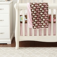 Spouting elephants in mod dot pink and blue highlight this whimsical print. A coordinating pin wheel print in shades of brown, pink, blue and green accent the animal motif. The Complete Sheet Set includes the complete sheet, crib skirt, nursery blanket and decorative wall decals.The American Academy of Pediatrics and the U.S. Consumer Product Safety Commission have made recommendations for safe bedding practices for babies. When putting infants under 12 months to sleep, remove pillows, quilts, comforters, and other soft items from the crib.