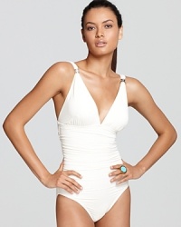 Nothing shows off sun-kissed skin like Carmen Marc Valvo's pristine maillot. Nothing shows off sun-kissed skin like Carmen Marc Valvo's pristine maillot.