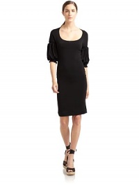 THE LOOKScoop necklineThree-quarter length sleeves with smocked detailsPullover styleTHE FITAbout 38 from shoulder to hemTHE MATERIAL90% viscose/10% spandexCARE & ORIGINHand wash or dry cleanImportedModel shown is 5'11 (180cm) wearing US size 4. THE LOOKScoop necklineThree-quarter length sleeves with smocked detailsPullover styleTHE FITAbout 38 from shoulder to hemTHE MATERIAL90% viscose/10% spandexCARE & ORIGINHand wash or dry cleanImportedModel shown is 5'11 (180cm) wearing US size 4.