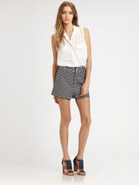 High-waisted with a flat front and chic double-button closure, all in an inky striped knit.High waistbandFlat frontZip-flyBack slash pocketsInseam, about 2Rise, about 1458% cotton/38% viscose/4% spandexMachine washImportedModel shown is 5'9½ (176cm) wearing US size 4. High-waisted with a flat front and chic double-button closure, all in an inky striped knit.High waistbandFlat frontZip-flyBack slash pocketsInseam, about 2Rise, about 1458% cotton/38% viscose/4% spandexMachine washImportedModel shown is 5'9½ (176cm) wearing US size 4.