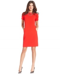 Make a statement in this sophisticated shift dress from Jones New York Collection. Make a statement in this sophisticated shift dress from Jones New York Collection.