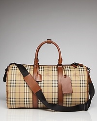 Ready for a weekend in the city or an escape to the country lodge, the Vintage Haymarket leather weekender features Burberry's signature plaid, tote handles and an adjustable shoulder strap. Ready for a weekend in the city or an escape to the country lodge, the Vintage Haymarket leather weekender features Burberry's signature plaid, tote handles and an adjustable shoulder strap.