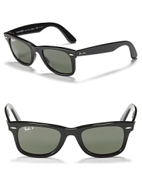Make an ultra cool statement in Ray-Ban's classic wayfarers with polarized lenses. Make an ultra cool statement in Ray-Ban's classic wayfarers with polarized lenses.