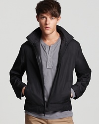 With its zip-in vest lining that can be worn alone, this sleek Michael Kors track jacket makes for a smooth winter warm-up. With its zip-in vest lining that can be worn alone, this sleek Michael Kors track jacket makes for a smooth winter warm-up.