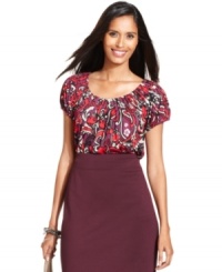 Style&co.'s boldly printed top will easily add a splash of color to your outfit. Style&co.'s boldly printed top will easily add a splash of color to your outfit.