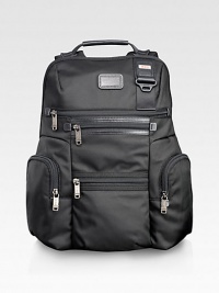 An endlessly versatile, always casual backpack design for business, school, commuting and travel in durable ballistic nylon. Zip closure Top handles Shoulder straps Exterior zip pockets Interior zip pockets, divider wall Nylon with leather accents 12W X 17H X 6D Imported An endlessly versatile, always casual backpack design for business, school, commuting and travel in durable ballistic nylon. Zip closure Top handles Shoulder straps Exterior zip pockets Interior zip pockets, divider wall Nylon with leather accents 12W X 17H X 6D Imported