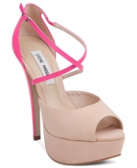 Colorblocking takes a sexy, subtle turn. Steve Madden's Aaria platform pumps feature slender crisscrossing straps around the ankle that provide the perfect contrast against the rest of the shoe. Colorblocking takes a sexy, subtle turn. Steve Madden's Aaria platform pumps feature slender crisscrossing straps around the ankle that provide the perfect contrast against the rest of the shoe.