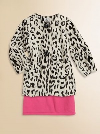 She'll be dressed for any occasion in this glamorous faux-fur coat finished with bold dome buttons and an exotic snow-leopard print.RoundneckLong sleevesFront button and snap closurePatch front pocketsPolyesterDry cleanMade in USA of imported fabricPlease note: Number of buttons may vary depending on size ordered. She'll be dressed for any occasion in this glamorous faux-fur coat finished with bold dome buttons and an exotic snow-leopard print.RoundneckLong sleevesFront button and snap closurePatch front pocketsPolyesterDry cleanMade in USA of imported fabricPlease note: Number of buttons may vary depending on size ordered.