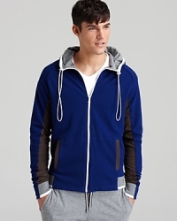Boating versatile style and innovative details, NUMBER:Lab's reversible hoodie is a sporty must-have. Boating versatile style and innovative details, NUMBER:Lab's reversible hoodie is a sporty must-have.
