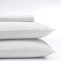 Geometric-print sheet set with circles allover. Fashioned from soft cotton for a comfortable rest. Geometric-print sheet set with circles allover. Fashioned from soft cotton for a comfortable rest.
