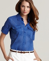 A sheer, bright blue Theory top takes a menswear-inspired style and lends it femininity with sheer texture, pleated pockets and a rounded hem. The result is a day-ready silhouette that updates staple separates with ease. A sheer, bright blue Theory top takes a menswear-inspired style and lends it femininity with sheer texture, pleated pockets and a rounded hem. The result is a day-ready silhouette that updates staple separates with ease.