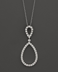 Diamond and 18K white gold pendant necklace from Roberto Coin. Diamond and 18K white gold pendant necklace from Roberto Coin.